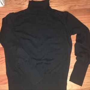 Simple sweater w/ small puff shoulder seams.